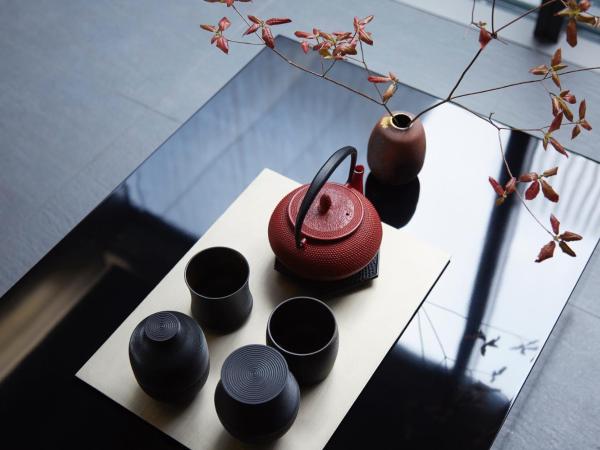 MOGANA : photo 7 de la chambre chambre double deluxe noire - vue sur jardin