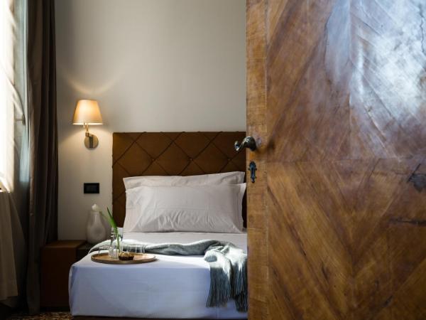 Riva del Vin BOUTIQUE HOTEL : photo 2 de la chambre petite chambre double