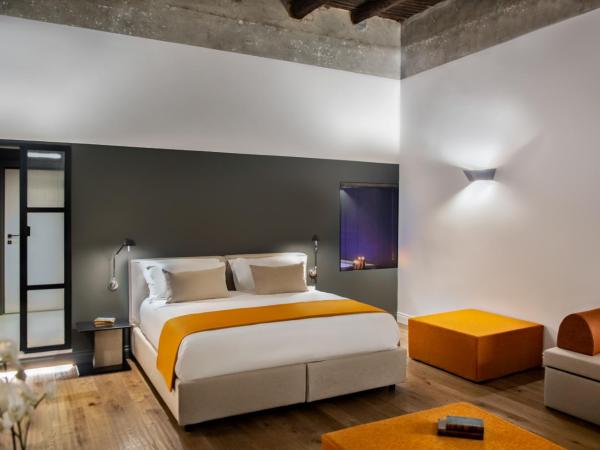 Artemisia Domus - Centro Storico : photo 1 de la chambre suite lit king-size avec baignoire spa