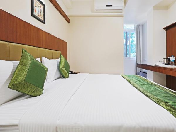 Treebo Akshaya Bull Temple : photo 5 de la chambre [sanitized] standard double room