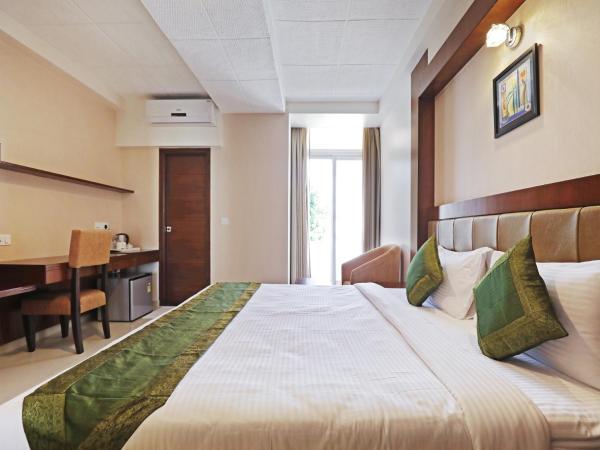 Treebo Akshaya Bull Temple : photo 3 de la chambre [sanitized] deluxe double or twin room