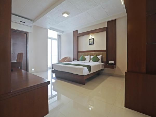 Treebo Akshaya Bull Temple : photo 5 de la chambre [sanitized] deluxe double or twin room