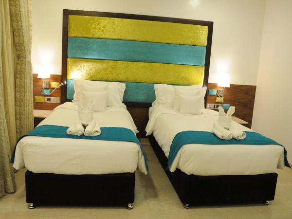 La Woods Hotel : photo 6 de la chambre chambre double ou lits jumeaux exécutive