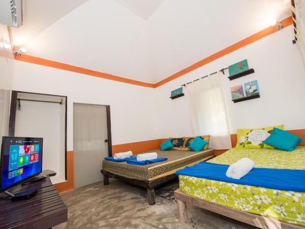 Ban_na : photo 8 de la chambre chambre lits jumeaux supérieure - vue sur jardin