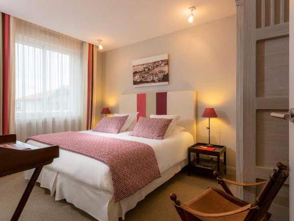 Hôtel La Réserve : photo 2 de la chambre chambre double ou lits jumeaux standard
