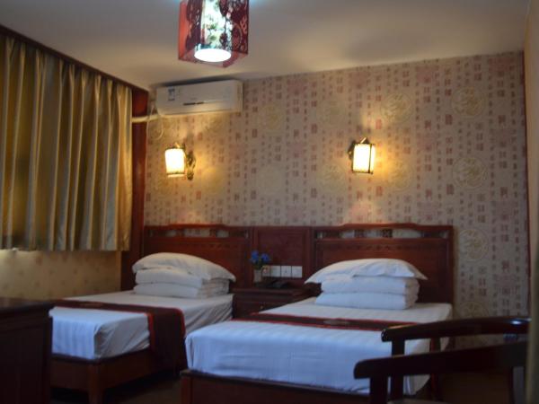 Qianmen Courtyard Hotel : photo 2 de la chambre chambre familiale