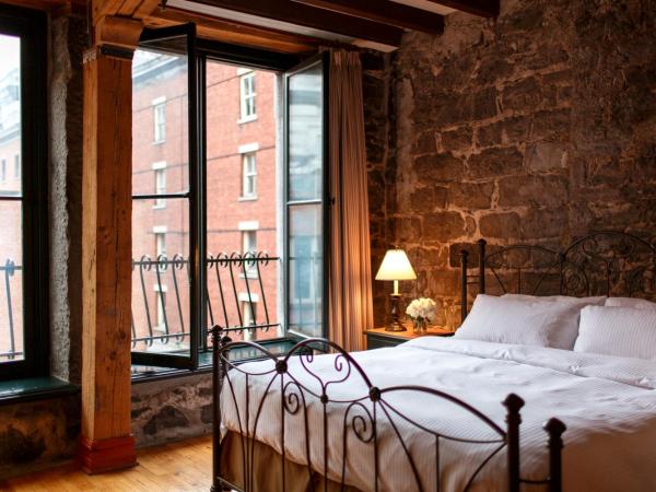 Auberge du Vieux Port by Gray Collection : photo 2 de la chambre chambre lit king-size signature - vue sur rue saint-paul