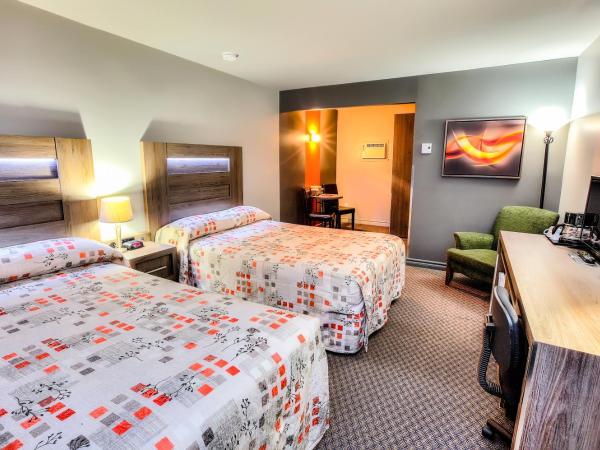 Hotel et Motel Le Chateauguay : photo 1 de la chambre chambre double standard avec 2 lits doubles