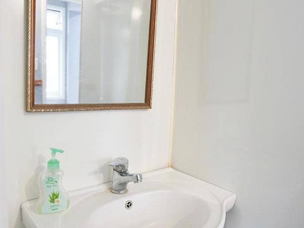 Kiwi As Guest House : photo 4 de la chambre chambre familiale avec salle de bains privative