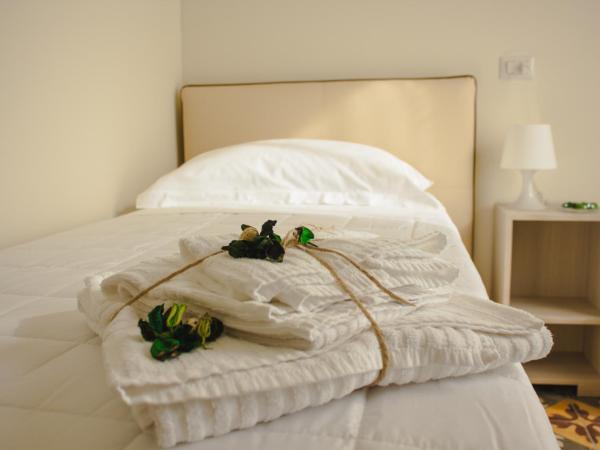 Pietre e Sassi : photo 2 de la chambre chambre simple avec salle de bains privative