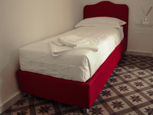 Pietre e Sassi : photo 7 de la chambre chambre triple avec salle de bains privative