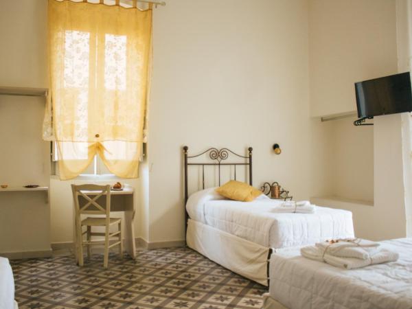 Pietre e Sassi : photo 7 de la chambre chambre quadruple avec salle de bains privative