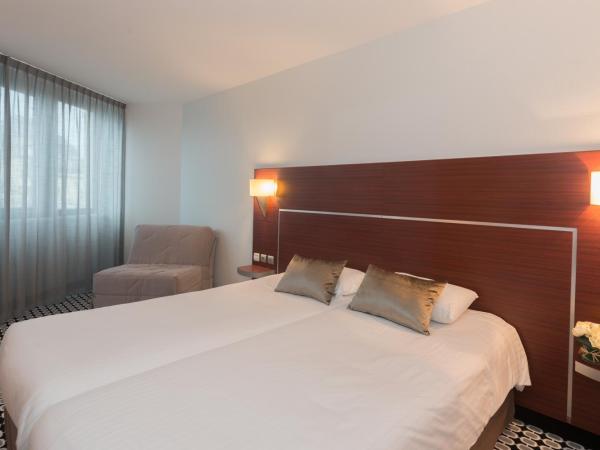 Kyriad Limoges Centre Gare - Atrium : photo 2 de la chambre chambre lits jumeaux standard