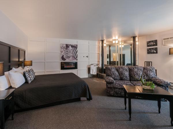 Hotel & Suites Monte-Cristo : photo 1 de la chambre suite lit king-size