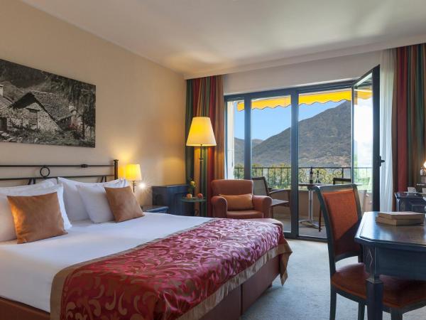 Boutique-HOTEL REMORINO, a Private Selection Hotel : photo 1 de la chambre chambre double supérieure - vue sur lac