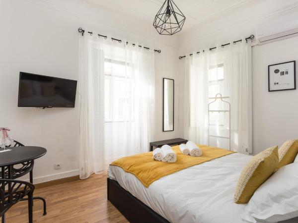 Rooms4All : photo 1 de la chambre chambre double supérieure avec salle de bains commune