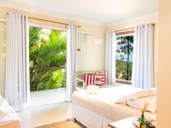 Pousada La Dolce Vita : photo 4 de la chambre suite principale avec baignoire - vue sur mer