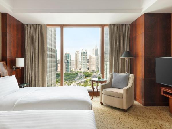 Pudong Shangri-La, Shanghai : photo 4 de la chambre chambre lits jumeaux exécutive