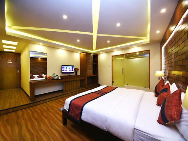 Hotel Jampa : photo 6 de la chambre suite lit king-size avec balcon - navette aéroport aller ou retour gratuite