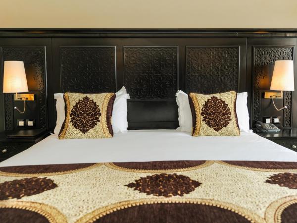 DWO Marrakech Ennakhil : photo 7 de la chambre chambre double ou lits jumeaux - vue sur piscine