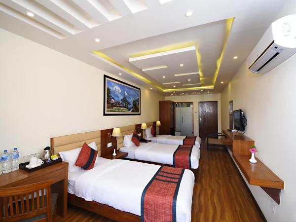 Hotel Jampa : photo 4 de la chambre chambre triple deluxe - navette aéroport aller ou retour gratuite