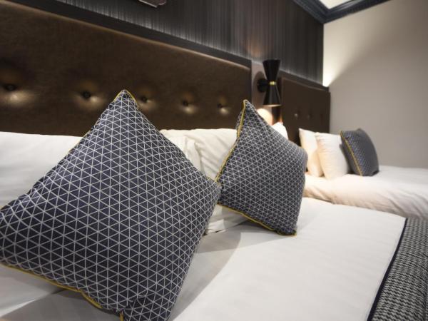 The House of Toby : photo 3 de la chambre chambre triple deluxe