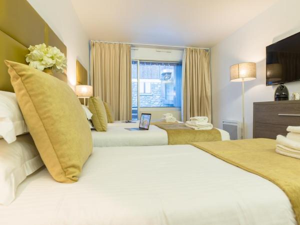 Madame Vacances - Hôtel Courchevel Olympic : photo 1 de la chambre chambre triple supérieure