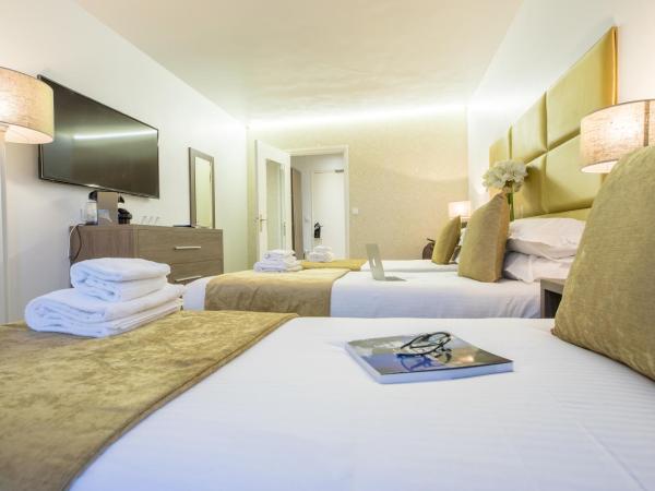 Madame Vacances - Hôtel Courchevel Olympic : photo 9 de la chambre chambre triple supérieure