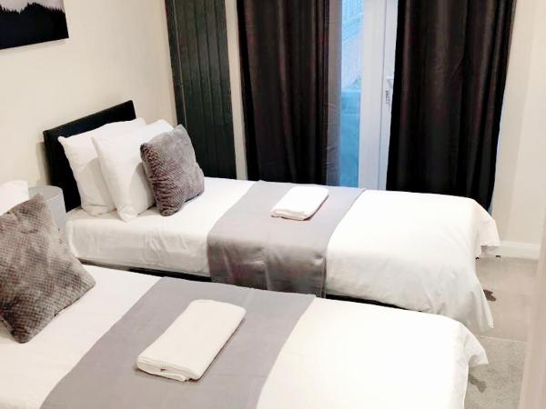 The 22 : photo 5 de la chambre chambre double ou lits jumeaux deluxe – vue sur jardin