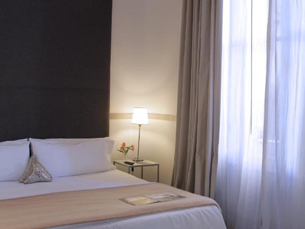 Esplendor by Wyndham Savoy Rosario : photo 4 de la chambre chambre standard lit queen-size