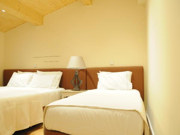 Naya-Downtown Guesthouse : photo 1 de la chambre chambre triple supérieure