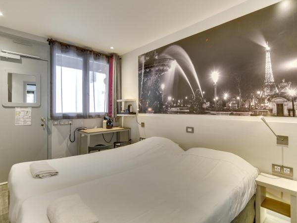 Kyriad Paris 12 - Nation : photo 5 de la chambre chambre lits jumeaux standard