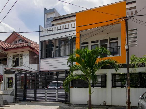 RedDoorz @ Tanjung Duren : photo 1 de la chambre chambre lits jumeaux