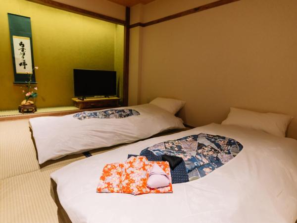 MAYU Bangkok Japanese Style Hotel : photo 8 de la chambre chambre double ou lits jumeaux deluxe – vue sur jardin