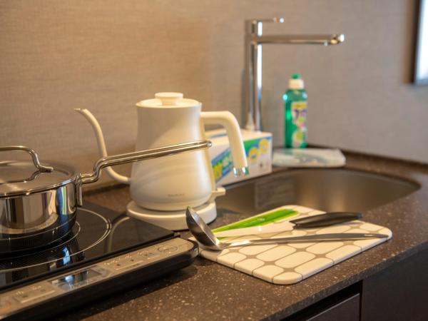 Tokyu Stay Kyoto Sakaiza Shijo Kawaramachi : photo 1 de la chambre premier twin room with washing machine,non-smoking