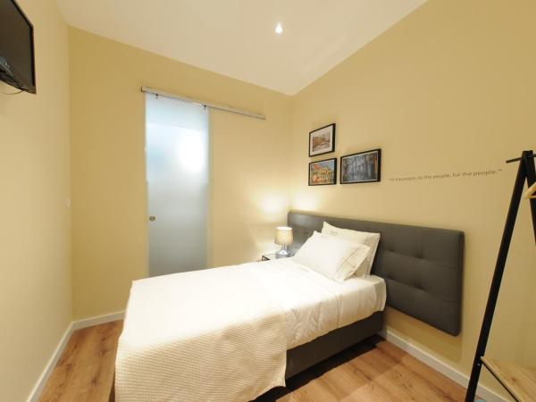 Naya-Downtown Guesthouse : photo 1 de la chambre chambre simple avec salle de bains privative