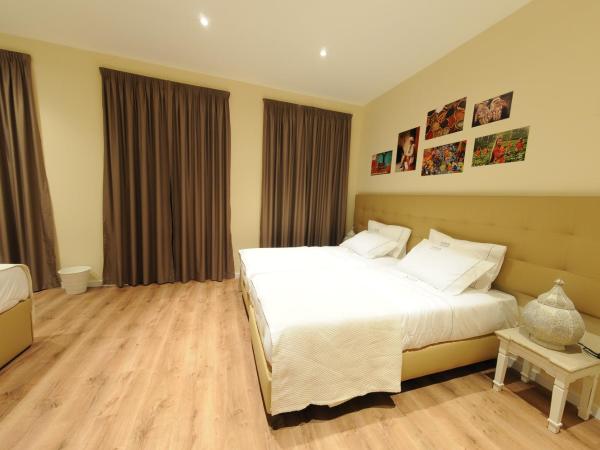 Naya-Downtown Guesthouse : photo 4 de la chambre chambre quadruple avec balcon