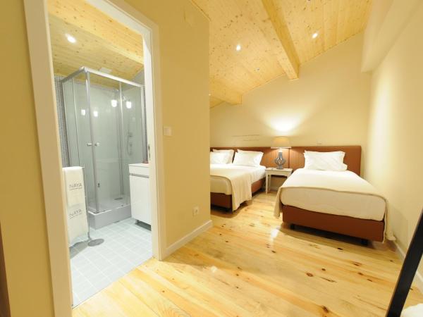 Naya-Downtown Guesthouse : photo 2 de la chambre chambre triple supérieure