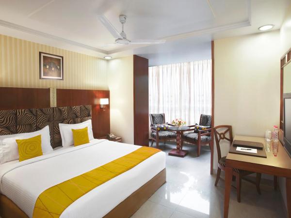 Hotel Suba Palace : photo 1 de la chambre cette chambre double ou lits jumeaux deluxe bénéficie d'une réduction de 10 % sur la nourriture, les boissons sans alcool et le service de blanchisserie par séjour.