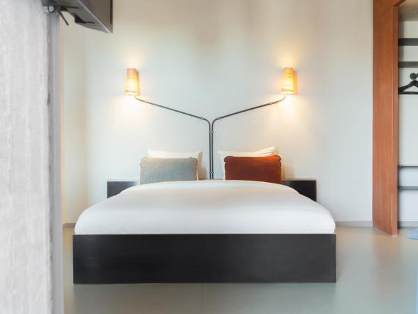 Volkshotel : photo 3 de la chambre chambre quadruple avec baignoire