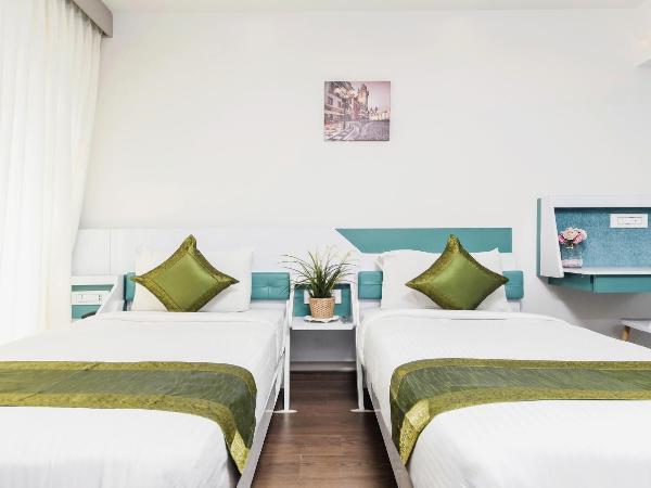 Treebo Stay Tuned JP Nagar : photo 4 de la chambre [sanitized] deluxe double or twin room