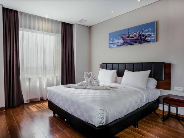 PrimeBiz Hotel Surabaya : photo 1 de la chambre suite