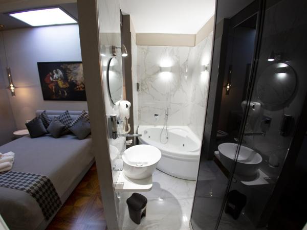 Leone Camere D'autore : photo 4 de la chambre suite avec baignoire spa