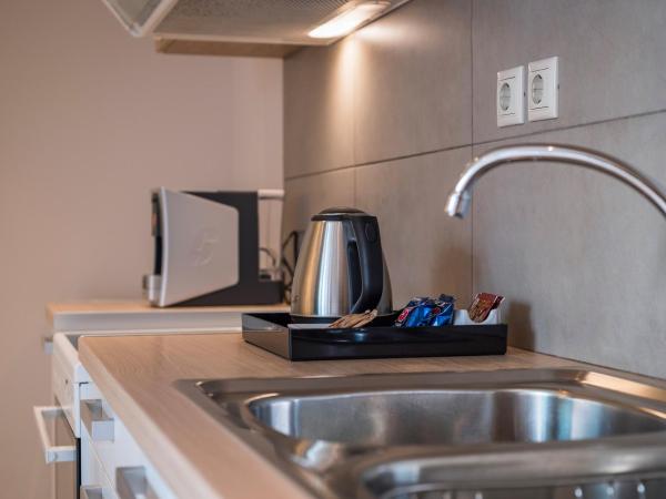 Trianon Luxury Apartments & Suites : photo 9 de la chambre appartement 1 chambre standard