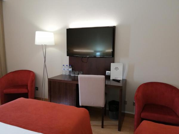 Hotel Monaco : photo 3 de la chambre chambre triple