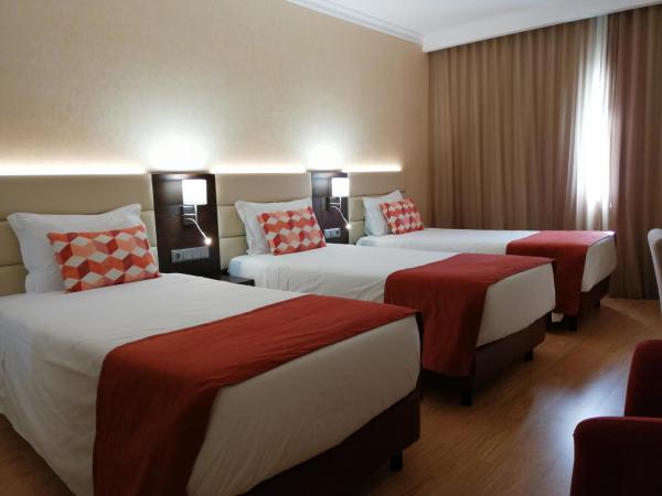 Hotel Monaco : photo 2 de la chambre chambre triple