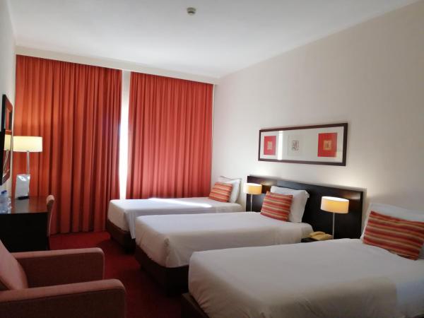 Hotel Monaco : photo 5 de la chambre chambre triple