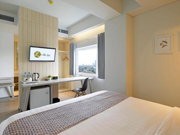 La Lisa Hotel Surabaya : photo 2 de la chambre grande chambre double ou lits jumeaux supérieure