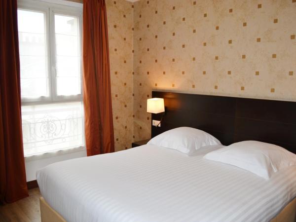 Hôtel de l'Exposition - Tour Eiffel : photo 4 de la chambre chambre double ou lits jumeaux supérieure