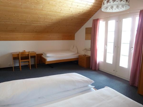 Berghaus Männlichen : photo 10 de la chambre chambre quadruple avec salle de bains privative